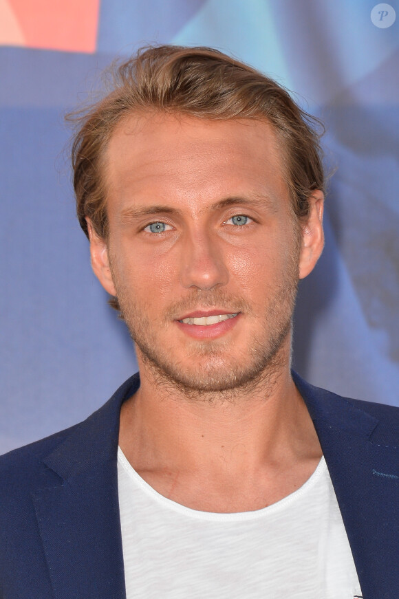 Lucas Pouille à la soirée "Evian Oversize" sur les toits des Galeries Lafayette à Paris, le 23 mai 2017. © Guirec Coadic/Bestimage