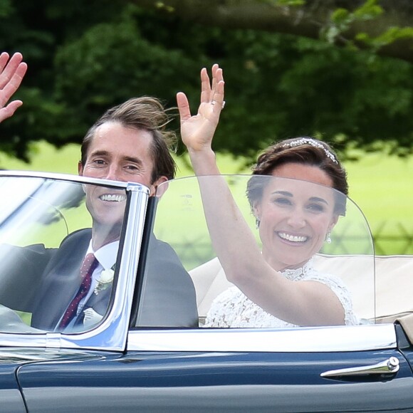 Pippa Middleton et son époux James Matthews lors de leur mariage à Englefield dans le Berkshire (Angleterre) le 20 mai 2017.