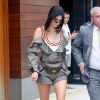 Kendall Jenner photographiée à New York le 1er juin 2017, porte un body Kendall + Kylie, un top et un short Self Portrait (collection automne-hiver 2017), une banane Louis Vuitton et des baskets YEEZY (modèle adidas Powerphase, "Calabasas").