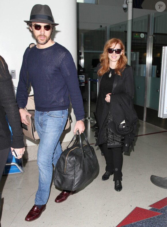 Jessica Chastain et son petit-ami Gian Luca Passi arrivent à l'aéroport de Los Angeles, le 8 janvier 2015.