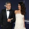 George Clooney (montre Omega) (montre de la marque Omega) et sa femme Amal Alamuddin-Clooney (enceinte) arrivant à la 42e cérémonie des César à la Salle Pleyel à Paris le 24 février 2017. © Olivier Borde / Dominique Jacovides / Bestimage