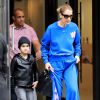 Céline Dion (vêtue d'un pull et d'un jogging Off-White™, tenant un sac Christian Dior et chaussée de baskets oversize Alexander McQueen) et ses enfants Eddy et Nelson sortent de l'hôtel Royal Monceau à Paris. Le 27 juin 2017.