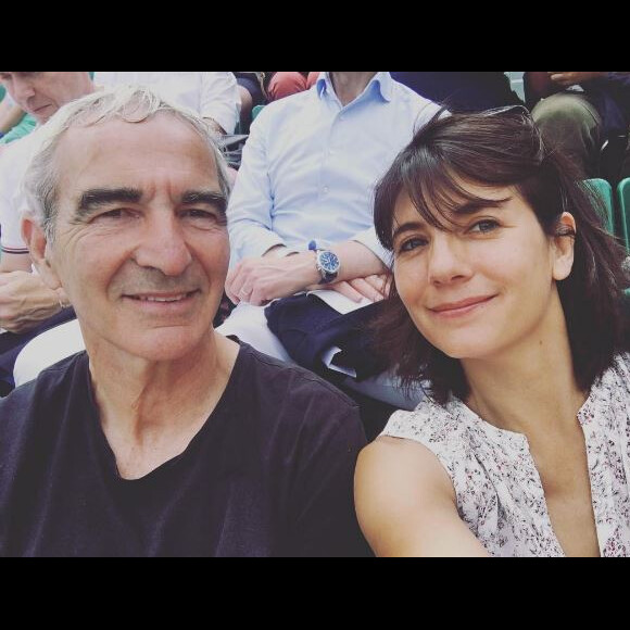Estelle Denis et son compagnon Raymond Domenech, à Roland Garros, en juin 2017