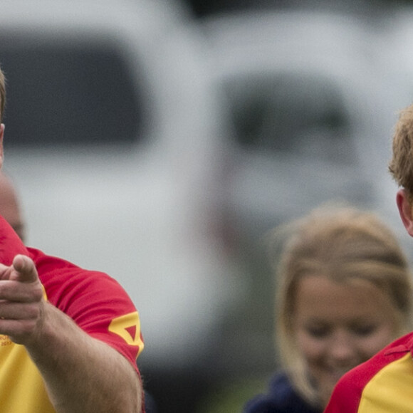 Le prince William et le prince Harry au tournoi de polo "The Jerudong Park Trophy" au club de Cirencester le 15 juillet 2017
