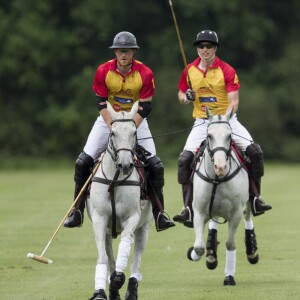 Le prince William et le prince Harry au tournoi de polo "The Jerudong Park Trophy" au club de Cirencester le 15 juillet 2017