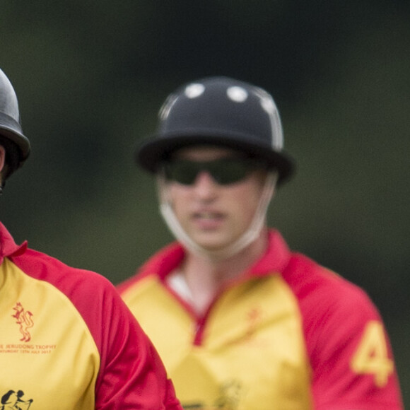 Le prince William et le prince Harry au tournoi de polo "The Jerudong Park Trophy" au club de Cirencester le 15 juillet 2017