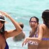 Ludivine Kadri Sagna s'amuse avec son fils Elias sur une plage à Miami, le 14 juillet 2017.