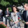 Kate Middleton et le prince William au Musée de la solidarité européenne à Gdansk le 18 juillet 2017, où ils ont eu l'ancien président Lech Walesa pour guide, au cours de leur visite officielle en Pologne.