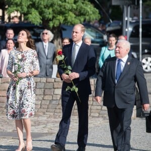 Kate Middleton et le prince William au Musée de la solidarité européenne à Gdansk le 18 juillet 2017, où ils ont eu l'ancien président Lech Walesa pour guide, au cours de leur visite officielle en Pologne.