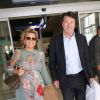 Christian Estrosi et sa femme Laura Tenoudji, enceinte , arrivent à l'aéroport de Nice à l'occasion du 70ème festival de Cannes le 17 mai 2017