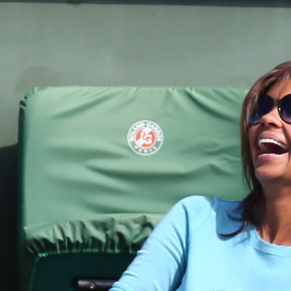 Karine Le Marchand et Stéphane Plaza - People dans les tribunes des Internationaux de France de tennis de Roland Garros à Paris. Le 1er juin 2015.