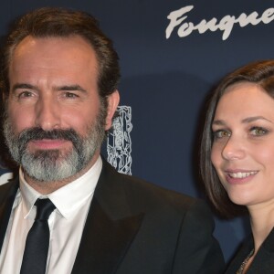 Jean Dujardin et sa compagne Nathalie Péchalat - Photocall du dîner de la 42e cérémonie des César au Fouquet's à Paris. Le 24 février 2017 © Giancarlo Gorassini / Bestimage