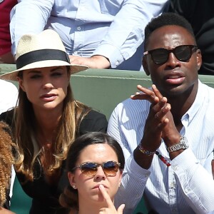 Ariane Brodier et son compagnon Fulgence Ouedraogo - Les célébrités dans les tribunes lors des internationaux de France de Roland Garros à Paris, le 4 juin 2017. © Dominique Jacovides-Cyril Moreau/Bestimage