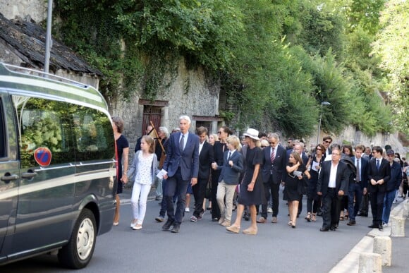 Edouard, Bernard et François Saint Bris, les frères de Gonzague lors des obsèques de Gonzague Saint Bris en la collégiale Saint Denis d'Amboise (Indre et Loire) le 14 août 2017.