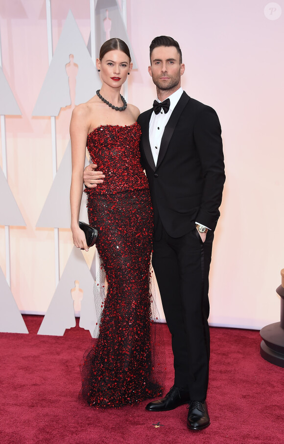Adam Levine et sa compagne Behati Prinsloo - People à la 87ème cérémonie des Oscars à Hollywood le 22 février 2015.