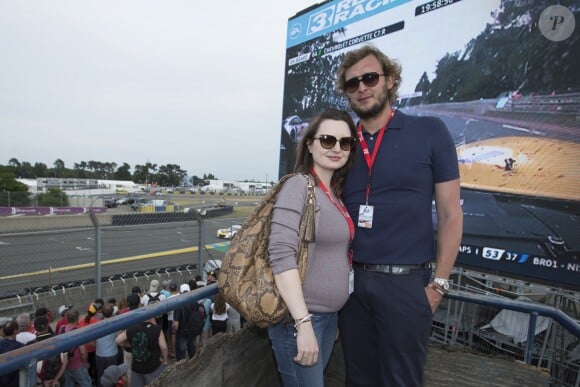 Exclusif - Amaury Leveaux et sa compagne Elizaveta (enceinte) au 24 heures du Mans le 13 juin 2015.