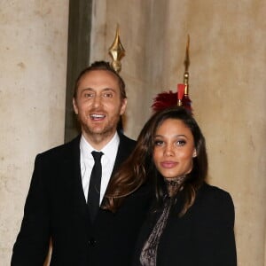 Le DJ David Guetta et sa compagne Jessica Ledon arrivent au dîner d'état donné en l'honneur du président cubain Raul Castro au palais de l'Elysée à Paris, le 1er février 2016. © Dominique Jacovides/Bestimages