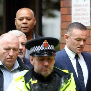 Wayne Rooney quitte le Palais de justice de Stockport. Il comparait pour conduite en état d'ébriété. Stockport, le 18 septembre 2017.