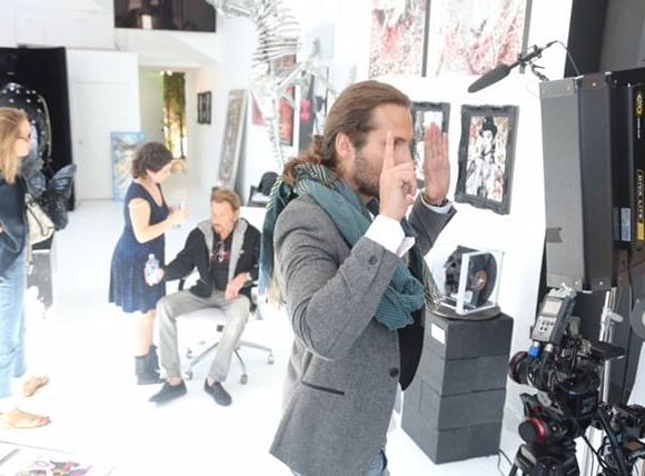 Johnny Hallyday lors du tournage du documentaire "Vif the movie", retraçant le parcours de Christian Audigier et son combat contre le cancer.