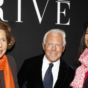 Liliane Bettencourt, sa fille Françoise Bettencourt-Meyers et Giorgio Armani au défilé haute-couture printemps-été 2012 à Paris le 24 janvier 2012.