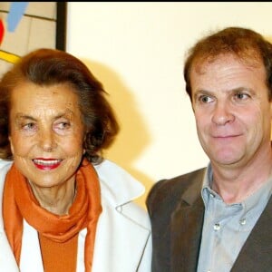 Liliane Bettencourt et François-Marie Banier à l'inauguration de l'exposition de François-Marie Banier à la Maison européenne de la photographie, à Paris, le 25 mars 2003.