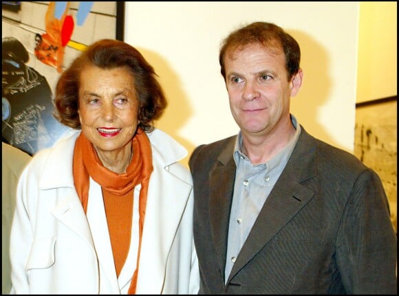 Liliane Bettencourt et François-Marie Banier à l'inauguration de l'exposition de François-Marie Banier à la Maison européenne de la photographie, à Paris, le 25 mars 2003.