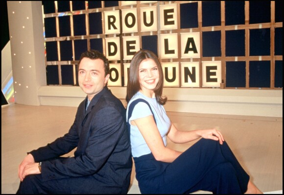 Olivier Chiabodo et Frédérique Le Calvez à la tête de "La Roue de la fortune", en décembre 1994.
