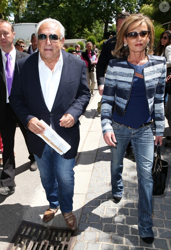 Dominique Strauss Kahn et sa compagne Myriam L'Aouffir aux Internationaux de France de tennis de Roland Garros le 30 mai 2015.