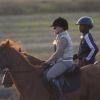 Exclusif - Madonna fait une balade à cheval sur la plage de Comporta avec son fils David, le 8 octobre 2017.