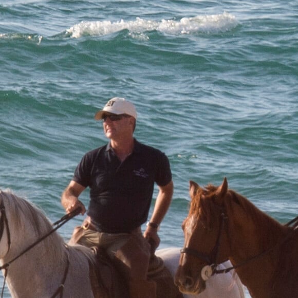 Exclusif - Madonna fait une balade à cheval sur la plage de Comporta avec son fils David, le 8 octobre 2017.