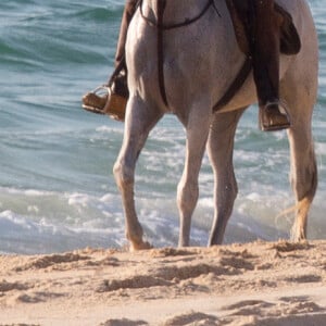 Exclusif - Madonna fait une balade à cheval sur la plage de Comporta avec son fils David, le 8 octobre 2017.