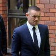 Wayne Rooney quitte le Palais de justice de Stockport. Il comparait pour conduite en état d'ébriété. Stockport, le 18 septembre 2017.