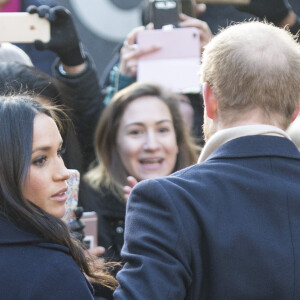 Meghan Markle avec le prince Harry à Nottingham le 1er décembre 2017, leur première mission royale ensemble après l'annonce de leurs fiançailles.