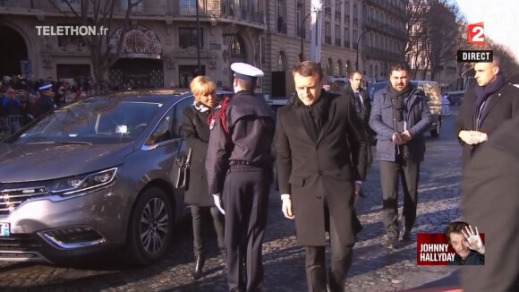 Emmanuel Macron et Brigitte Macron arrivent à l'église de la Madeleine pour les obsèques de Johnny Hallyday, à Paris le 9 décembre 2017.