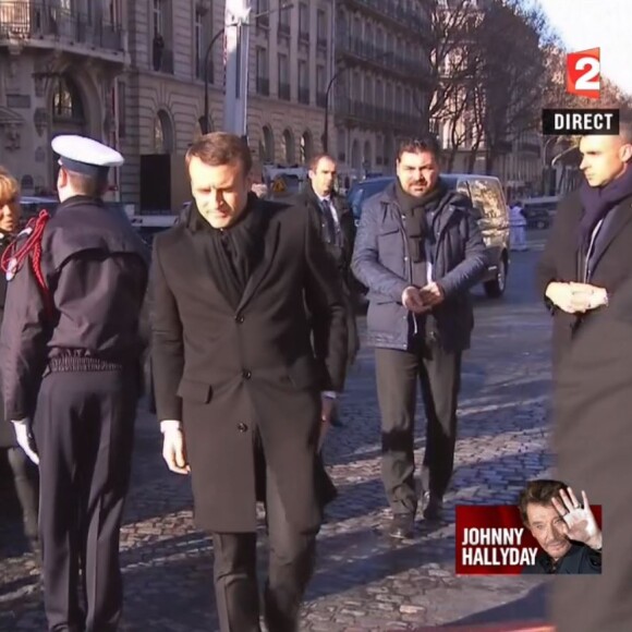 Emmanuel Macron et Brigitte Macron arrivent à l'église de la Madeleine pour les obsèques de Johnny Hallyday, à Paris le 9 décembre 2017.