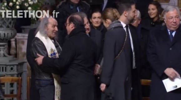 François Hollande arrivent à l'église de la Madeleine pour les obsèques de Johnny Hallyday, à Paris le 9 décembre 2017.