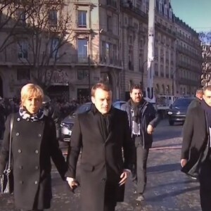 Emmanuel Macron et Brigitte Macron arrivent à l'église de la Madeleine pour les obsèques de Johnny Hallyday, à Paris le 9 décembre 2017.