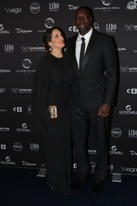 Omar Sy et sa femme Hélène au photocall de la 11ème cérémonie des Globes de Cristal au Lido à Paris le 30 janvier 2017. © CVS / Bestimage