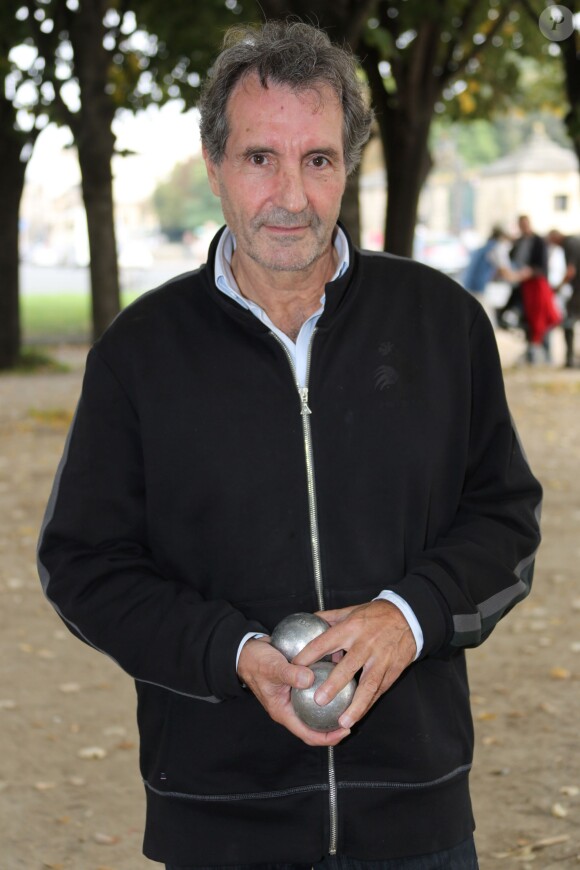 Jean Jacques Bourdin à un tournoi de petanque, Place des Invalides à Paris le 29 septembre 2013.