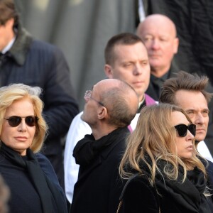 Tony Scotti, le père Guy Gilbert, Sylvie Vartan, Laura Smet, David Hallyday - Sorties de l'église de la Madeleine après les obsèques de Johnny Hallyday à Paris le 9 décembre 2017. © Veeren / Bestimage