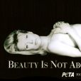  Kim Basinger nue pour la PeTA en 1994. 