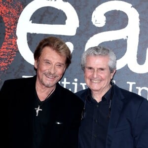 Johnny Hallyday et Claude Lelouch - Soirée d'ouverture du 6ème Festival International du Film Policier de Beaune avec un hommage à Johnny Hallyday pour l'ensemble de sa carrière cinématographique, le 2 avril 2014.