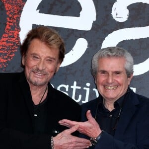 Johnny Hallyday et Claude Lelouch - Soirée d'ouverture du 6ème Festival International du Film Policier de Beaune avec un hommage à Johnny Hallyday pour l'ensemble de sa carrière cinématographique, le 2 avril 2014.