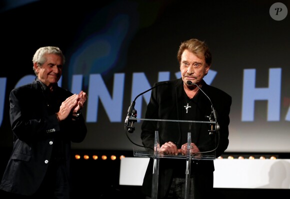 Claude Lelouch et Johnny Hallyday - Soirée d'ouverture du 6ème Festival International du Film Policier de Beaune avec un hommage à Johnny Hallyday pour l'ensemble de sa carrière cinématographique, le 2 avril 2014.