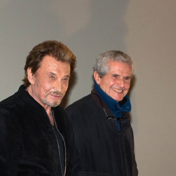 Johnny Hallyday de passage en Belgique pour l'avant-première du film "Salaud, on t'aime" en présence de Claude Lelouch et de l'actrice belge Isabelle de Hertogh, au Kinepolis Imagibraine, à Braine-l'Alleud. 28 mars 2014.