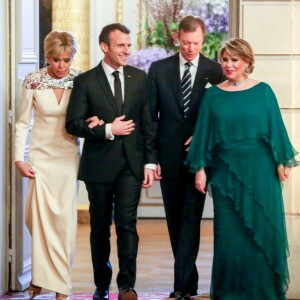 Le président de la République Emmanuel Macron, son épouse Brigitte Macron, le grand-duc Henri de Luxembourg et la grande-duchesse Maria Teresa de Luxembourg - Le grand-duc et la grande-duchesse de Luxembourg assistent au dîner d'Etat organisé au Palais de l'Elysée par le président de la République et la première dame à l'occasion d'une visite d'Etat en France à Paris, le 19 mars 2018. © Hamilton/Pool/Bestimage