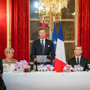 Le président de la République Emmanuel Macron, son épouse Brigitte, le grand-duc Henri de Luxembourg et la grande-duchesse Maria Teresa de Luxembourg - Le grand-duc et la grande-duchesse de Luxembourg assistent au dîner d'Etat organisé au Palais de l'Elysée par le président de la République et la première dame à l'occasion d'une visite d'Etat en France à Paris, le 19 mars 2018. © Hamilton/Pool/Bestimage