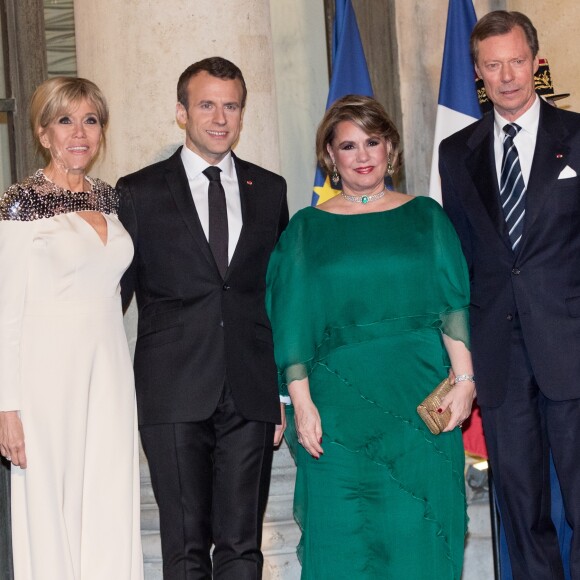 Le président de la République Emmanuel Macron, son épouse Brigitte Macron, le grand-duc Henri de Luxembourg et la grande-duchesse Maria Teresa de Luxembourg - Le grand-duc et la grande-duchesse de Luxembourg assistent au dîner d'Etat organisé au Palais de l'Elysée par le président de la République et la première dame à l'occasion d'une visite d'Etat en France à Paris, le 19 mars 2018. © Jacovides-Moreau/Bestimage