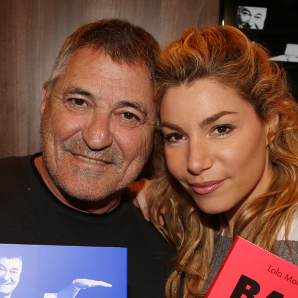 Jean-Marie Bigard et sa femme Lola Marois lors du salon du livre de Paris le 17 Mars 2018 à la Porte de Versailles de Paris. © Denis Guignebourg/Bestimage