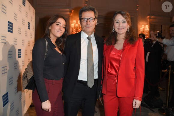 Daniela Lumbroso et son mari Eric Ghebali et leur fille Carla - Soirée de Gala de bienfaisance de La Fondation pour la Recherche en Physiologie à l'hôtel George V à Paris le 19 mars 2018. © Coadic Guirec/Bestimage